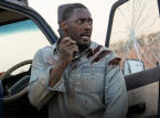 Idris Elba is chased by a lion in the Beast trailer