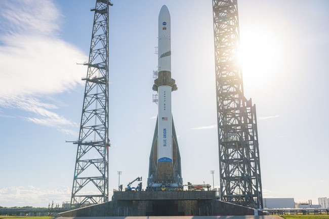 Jeff Bezos's Blue Origin lands largest reusable rocket for first time, in challenge to Musk